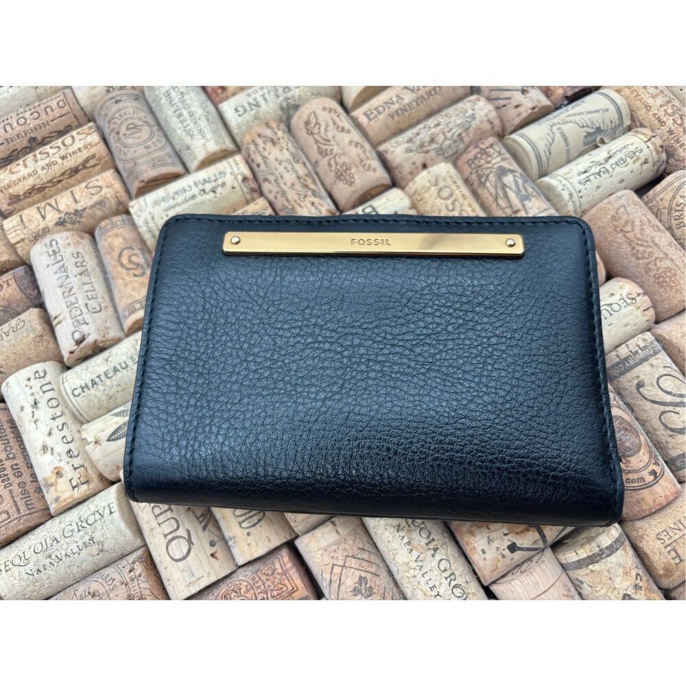 Fossil black pebbled leather bifold wallet with gold-tone details